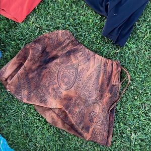 Says x-large but adjustable waist allows for it to fit small!